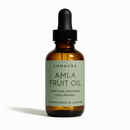 Lumaura amla fruit oil in a glass bottle for hair growth