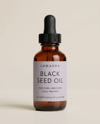 Lumaura organic black seed oil in an amber glass dropper bottle