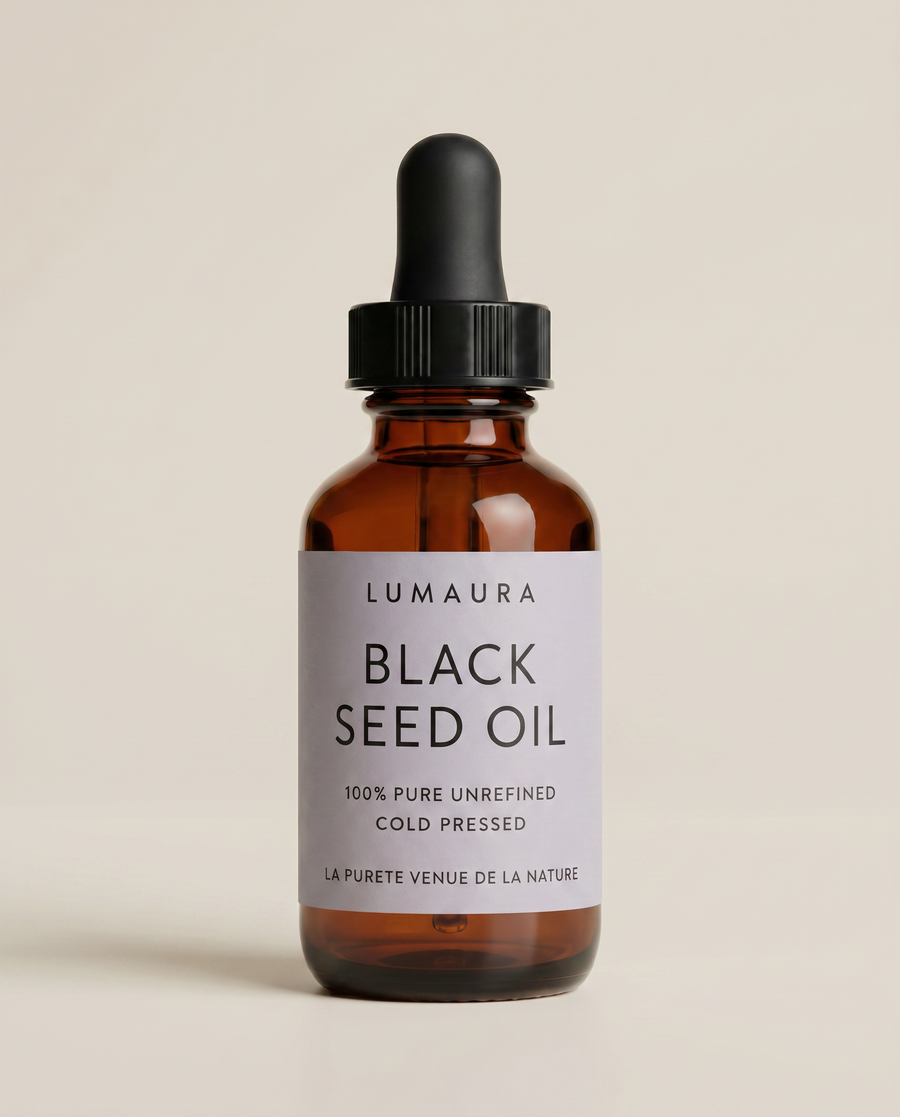 Lumaura organic black seed oil in an amber glass dropper bottle