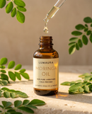 Moringa oil dropper bottle with Lumaura label, front view
